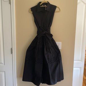 Fit and flare black tiered eyelet shirt dress